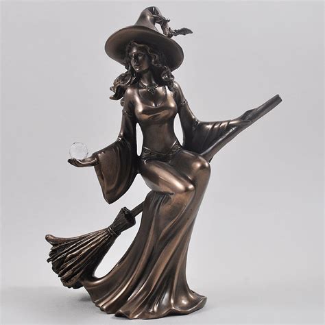 The Fascinating Symbolism of Colors in Rotating Witch Statuettes